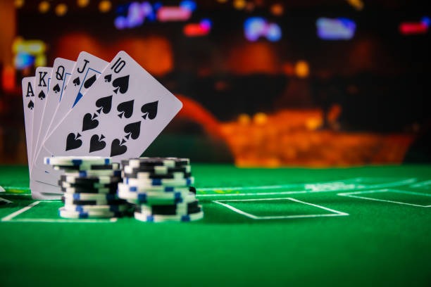 Live casino dealer at blackjack table
